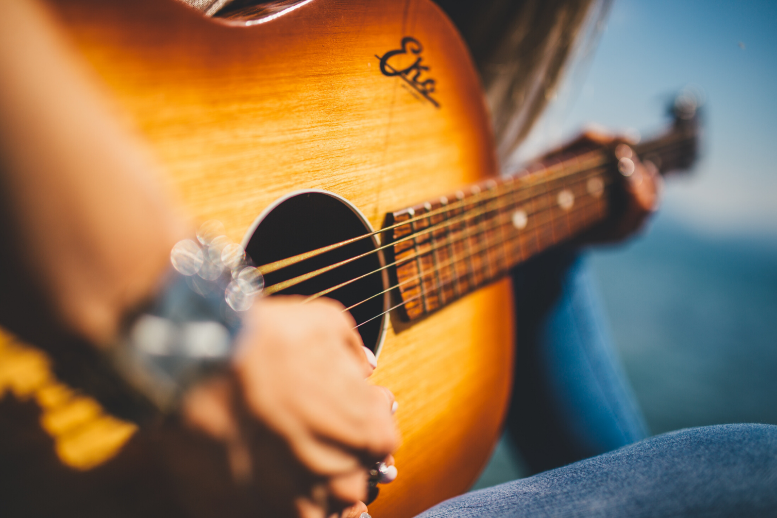 Man Playing Guitar | Which Is The Easiest Guitar To Learn For Beginners?